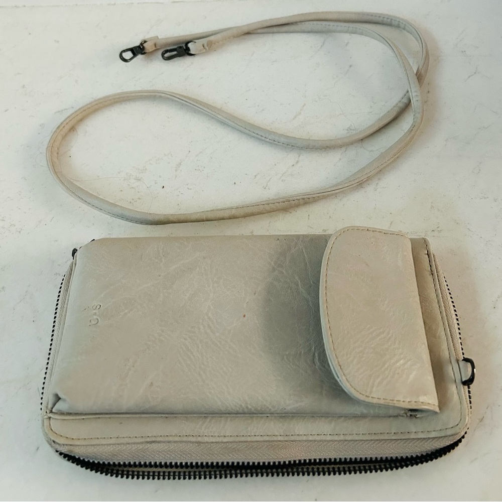 New s-q leather cross body wallet.
